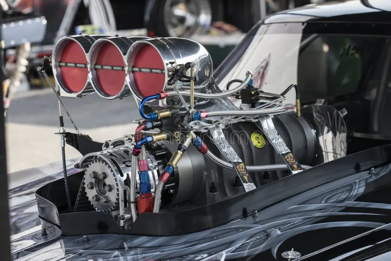 Blown drag racing engine with triple scoop intake